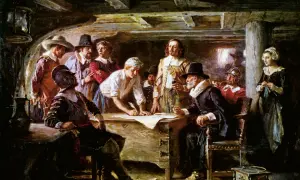 Pielgrzymi przy stole, jeden pisze, inni patrzą. To scena z życia na statku przed przybyciem do Plymouth Rock.