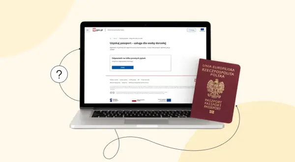 Czy do Grecji potrzebny jest paszport? Na laptopie widać stronę gov.pl z informacją o uzyskaniu paszportu, obok leży polski paszport.