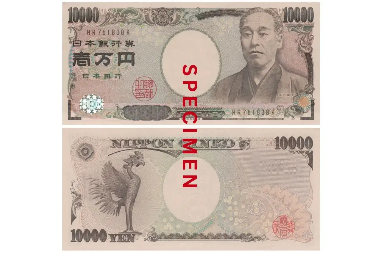 Dwie strony japońskiego banknotu 10000 jenów. Na awersie portret Yukichi Fukuzawy, na rewersie mityczny ptak Feniks. Waluta Japonii.